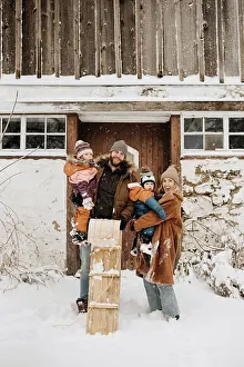 Cold Temperature Prints: Canada, Ontario, Winter portrait of family with children (12-17 months, 2-3)