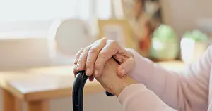 Disability Prints: Cane, hands and senior woman with disability