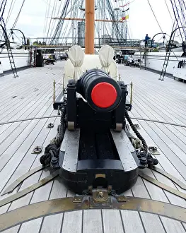 Royal Prints: Cannon on the deck of HMS Warrior; the Royal Navy's first ironclad ocean-going armoured battleship