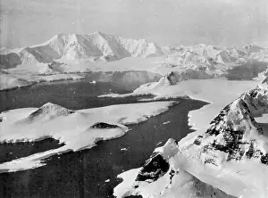 Glacier Prints: Captain Sir Hubert Wilkins stirring camera record of the second Hearst-Wilkins Antarctic Expedition