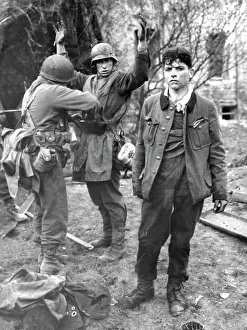 Picture Prints: Captured Green Sniper Searched An American Soldier searches a German sniper captured with his comrade by Yanks of *****