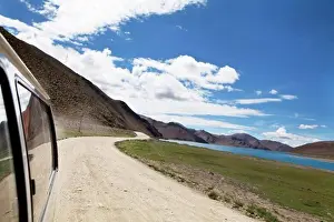 Dirt Road Prints: Car on a dirt road, Tibet