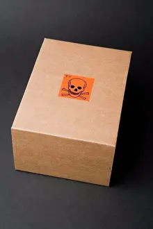 Cardboard box with toxic label