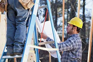 Manual Worker Prints: Carpenter explaining house plans