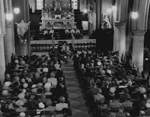 Michael Prints: Cathedral service. Mr. Chifley's coffin lies between six flickering candles below the altar