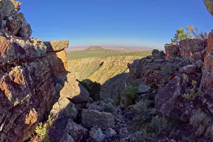 Arid Prints: Cedar Mountain viewed from a crevice in a rock island just off the cliff line east of Desert View Point at Grand Canyon