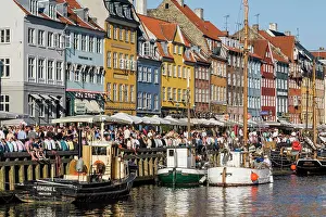 Sound Prints: Celebrating the warm evening after work, Nyhavn, the old city, Copenhagen, Denmark