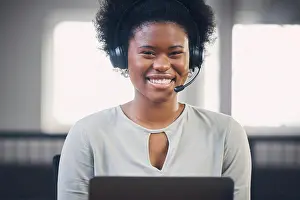 Customer Prints: Call center, portrait or happy black woman typing in office building startup agency with smile or support