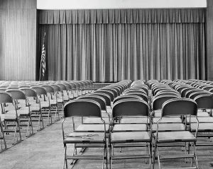 Curtain Prints: Empty chairs in an auditorium of a school