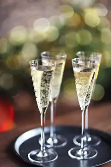 Tableware Prints: Champagne glasses on lights background. Christmas celebration background