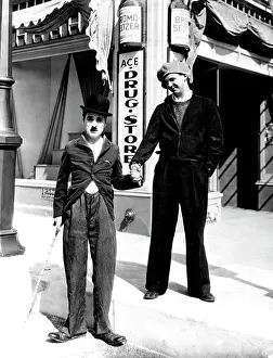 Composer Prints: Charlie Chaplin Meets 'The Kid' Grown Up -- Jackie Coogan (right)