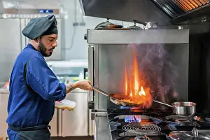 Prepare Prints: Chef cooking with flame in frying pan