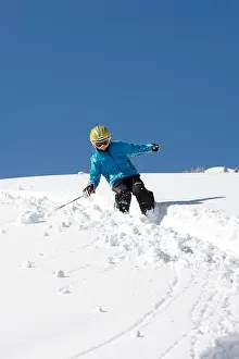 Sports Clothing Prints: Child skiing in deep snow, Schlosslelift, Hirschegg, Kleinwalsertal, Vorarlberg, Austria