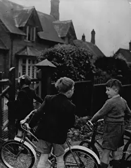 Bicycle Prints: The children cycle through the Royal Forest to the gabled red brick building which stands close to Royal Lodge