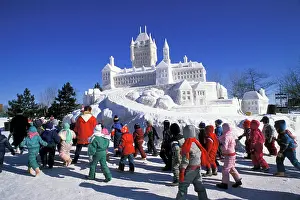 Large Group Prints: Children looking at snow sculpture at Winterlude Festival