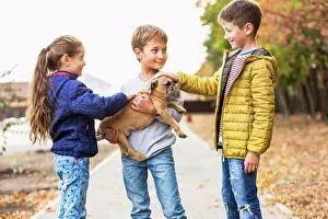 Life Styles Prints: Children playing with dog outdoors
