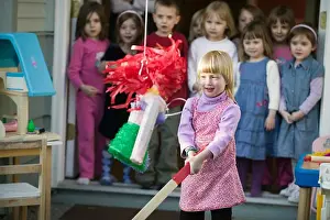 Celebrate Prints: Children Trying to Break Open a Pinata at a Birthday Party