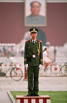 Courtyard Prints: Chinese soldier standing on a platform in Tiananmen Square