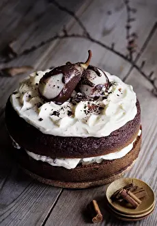 Christmas Prints: Chocolate cake with pears on wooden table