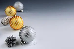 Decorations Prints: Christmas arrangement with glass bauble ornaments and pine cones, background