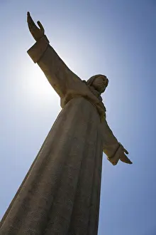 Outstretched Prints: The Christus Rei statue, a depiction of Jesus Christ with outstretched arms