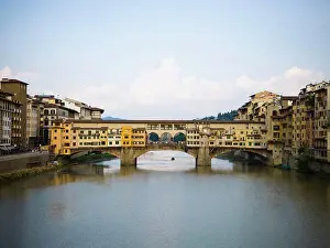 Florence Prints: City skyline on waterfront with bridge and reflection