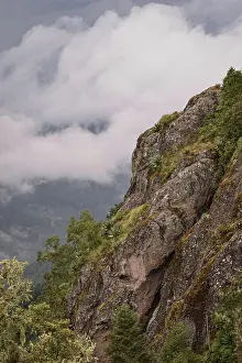 Non Urban Prints: Cliff in a forest landscape with cloudy skies in Oaxaca, Mexico