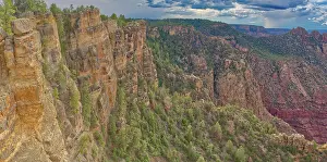 Arid Prints: The cliff walls of Buggeln Hill at Grand Canyon Arizona with a storm brewing in the background