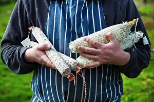 Artisan Prints: Close up of a butcher wearing a striped blue apron