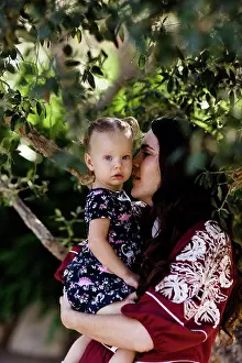 Vista Prints: Close Up of Mom Holding Daughter Under Tree in California