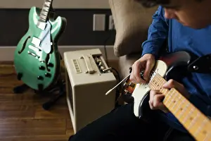 Electric Prints: Close up of musician playing electric guitar