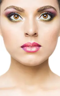 Chic Prints: Close up portrait of a beautiful young brunette model with bright make up