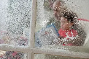Share Prints: Close up of snow on window at Christmas