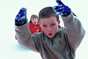 10 11 Years Prints: Close-up of a boy playing with snow