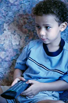 Curiosity Prints: Close-up of a boy watching television