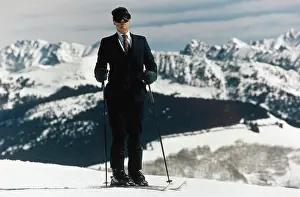Business Suit Prints: Close-up of a businessman holding ski poles