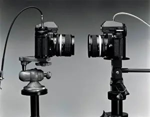 Cable Prints: Close-up of two cameras