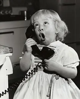 Talk Prints: Close-up of a girl talking on the telephone