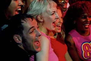 Earring Prints: Close-up of a group of friends laughing together