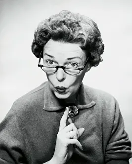 Puckering Prints: Close-up of a mid adult woman puckering her lips