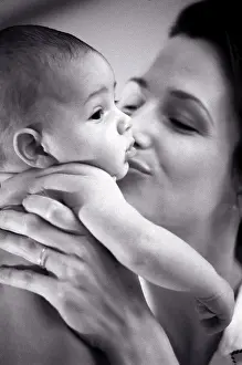 Life Events Prints: Close-up of a mother kissing her baby boy