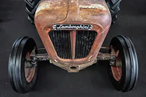 Luxury Prints: Close-up of an old Lamborghini tractor with brand emblem