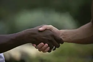 Partnership Prints: Close-up of two people shaking hands