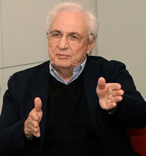 Conversation Prints: Close-up portrait of Frank Gehry, an architect in the midst of a discussion in New York