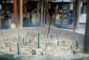 Purity Prints: Close_up of a purification incense bowl at the entrance of a japanese temple, kyoto, japan