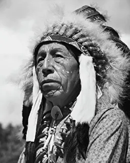 Feather Prints: Close-up of a Sioux man
