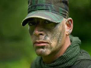 Marines Prints: Close-up view of a U.S. Special Forces soldier with camouflage face paint