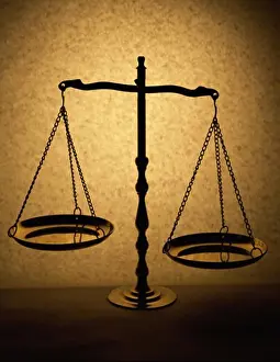 Justice Prints: Close-up of a weighing scale