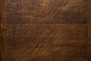 Cuts Prints: Close-up of worn antique cutting board with knife cut marks