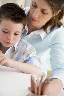 Hobbies Prints: Close-up of a young woman teaching her son to draw